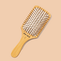 Brosse à cheveux BKIND - Fond beige